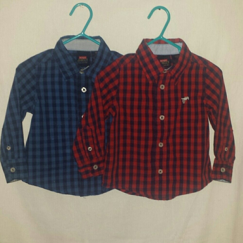 Two nice button down long sleeved shirts.